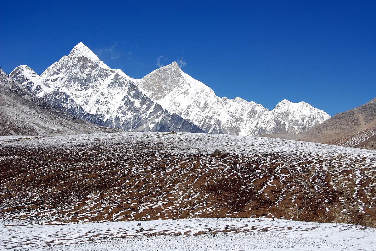 01 Ice Tooth, Shishapangma, Nyanang Ri and Phola Gangchen Up Valley Just After Leaving Shingdip On Trek To Shishapangma Advanced Base Camp Just after leaving Shingdip a valley opens up with a view of Ice Tooth (6200m), Shishapangma�s Southwest Summit, Nyanang Ri (7071m), and Phola Gangchen (7716m).